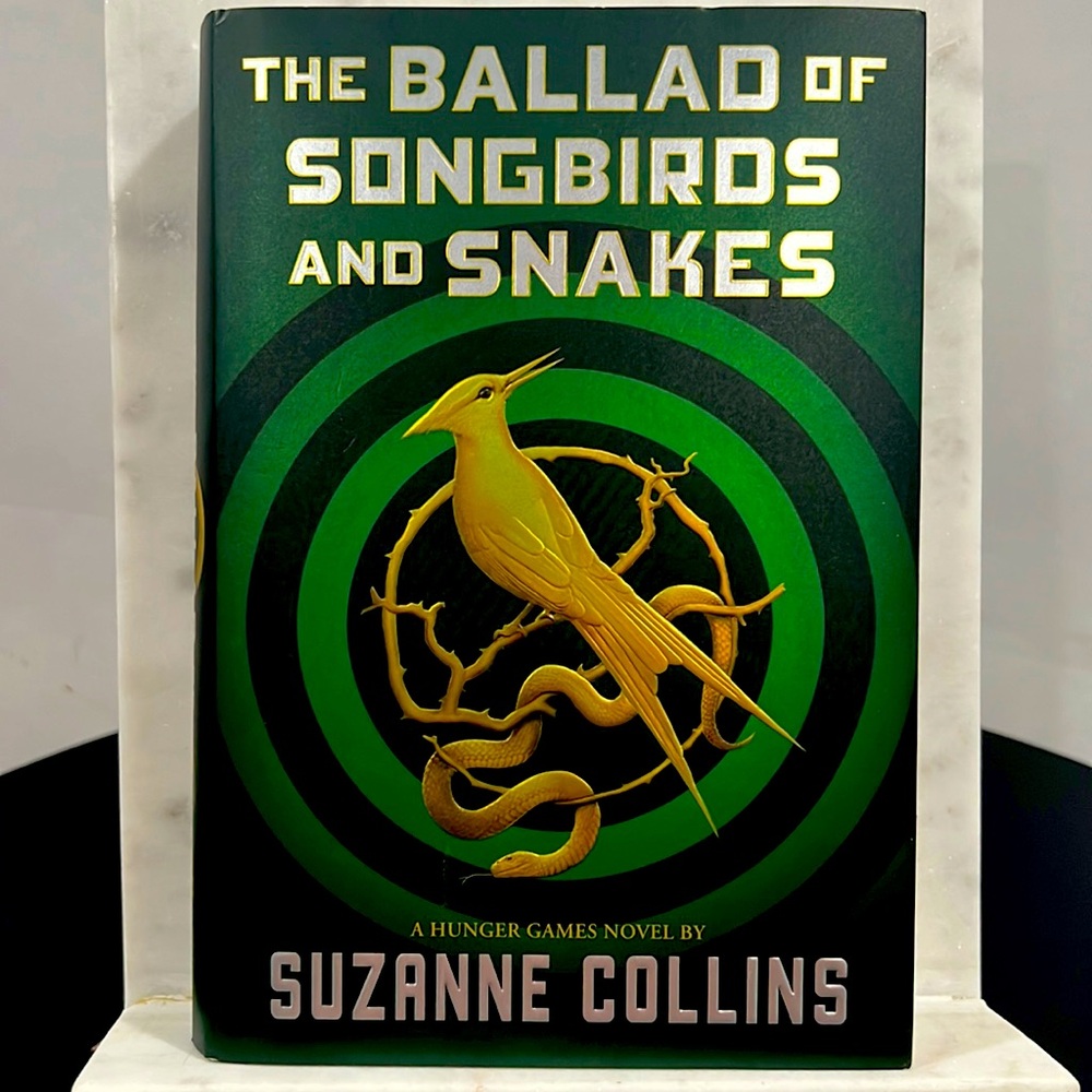The ballad of songbirds and snakes, a hunger games, novel by Suzanne Collins